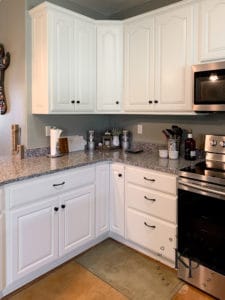 After photo of painted oak kitchen cabinets in Benjamin Moore Soft Chamois